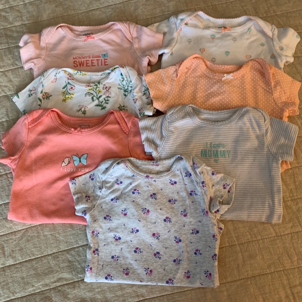 SOLD 7 Carter’s onesies